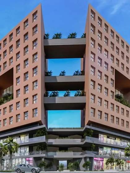 A frontal view of the "symbiotic" residential structure, highlighting the large openings that create sky gardens and allow for cross-ventilation. The design challenges traditional boundaries by integrating nature vertically through the building.