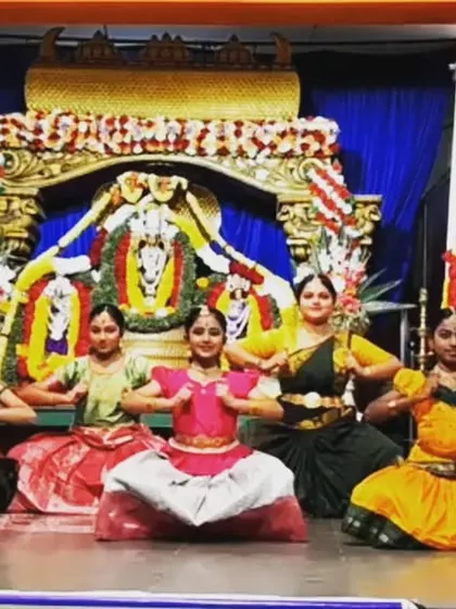 The full Rhythmotion ensemble in a final pose during the Kanaka Purandara festival, celebrating the rich heritage of Karnataka's poet-saints.