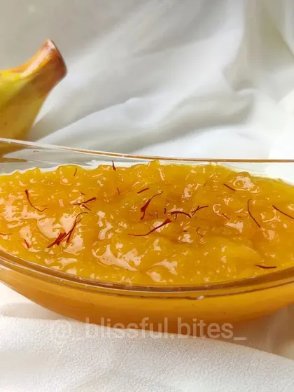 A serving of my traditional Aam ka Murabba, a sweet mango preserve. Made with raw mangoes and saffron, this is a classic summer delicacy that brings back fond memories.
