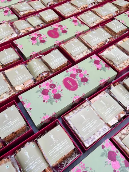 A large order of our gift hampers, filled with assorted teacakes and crackers, ready for a special event.