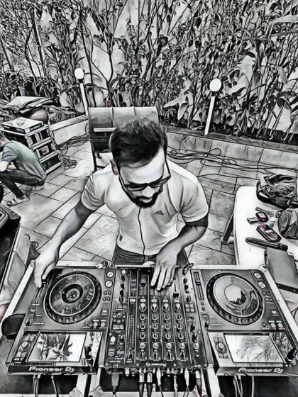 A cool black and white artistic shot of me at the DJ console during an outdoor pool party setup. Beat, Bass, Bang.