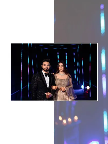 A stylish, modern portrait of Akhilesh and Nisha. The neon-lit background and their confident pose create a chic, party-ready vibe.