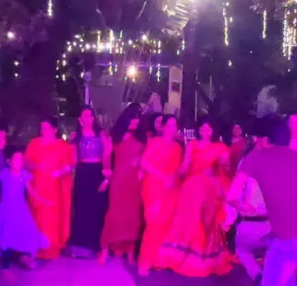 The ladies take over the dance floor at this Tamil wedding.