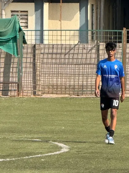 A player walks on the pitch after securing the first win of the First Division. The journey from our batches to league success is a rewarding one.