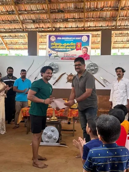 Receiving a certificate of participation at a Silambam workshop in Palakkad. It was a great opportunity to learn Kuthuvarisai, a traditional fighting technique.