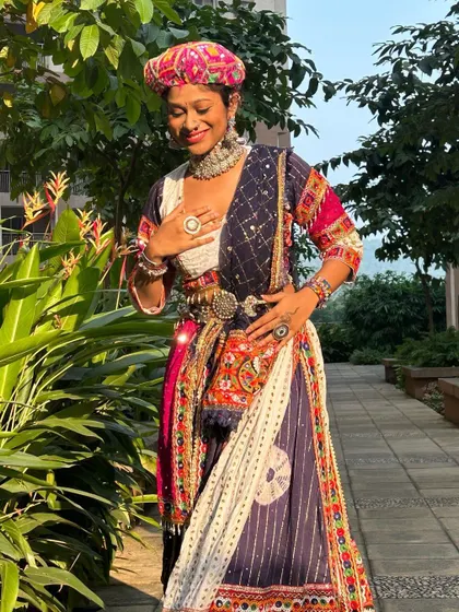 The outfit looks great even while relaxing. The vibrant colors and comfortable fit make it perfect for the entire evening.