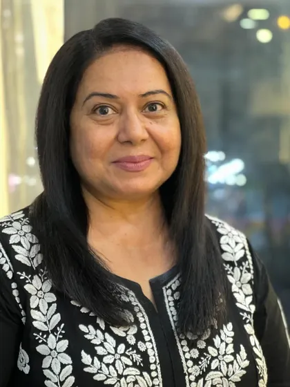 A portrait of Neelu Vaghela after her expert cut and protein treatment. She looks absolutely radiant.