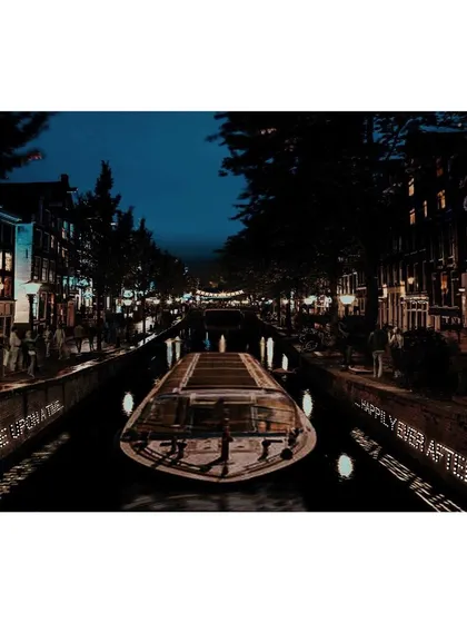 This earlier light installation for a festival plays with narrative and text. The phrases 'Once upon a time' and 'Happily ever after' are projected onto the canal walls, inviting those on passing boats to reflect on their own stories in a magical, dreamlike setting.