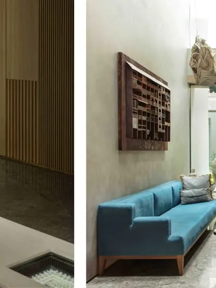 A view of the ground floor family lounge, where a Shibori and origami hanging light installation by Ankon Mitra becomes a central feature. It casts a soft, artistic glow, tying together the room's blend of tradition and contemporary design.