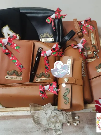 A look at a fully loaded Christmas hamper we created for actor Abrar Qazi. This set features 13 distinct, personalized leatherette items, including a wallet, passport cover, and travel pouches, all customized with his name and a signature charm.