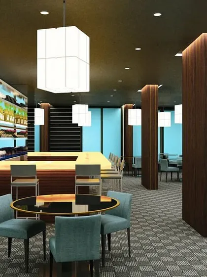 The indoor amenities at Embrace Towers include this sophisticated lounge and dining area. The design provides a tailor-made space for residents to socialize and relax in style.