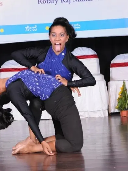 A fierce and playful moment captured on stage. This pose, inspired by the energy of Navaratri, represents the victory of good over evil and the power we hold within.