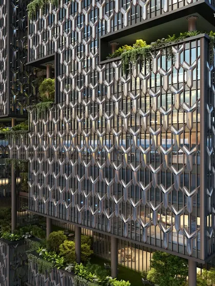 A detailed shot of the honeycomb facade of the Worli commercial tower. This element is a testament to cutting-edge innovation, creating a visually striking pattern that is both aesthetic and structurally sound.