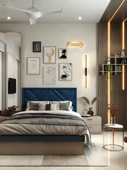 A modern bedroom with a gallery wall above the bed. The design includes a built-in bookshelf and a floating side table, maximizing functionality in a stylish way.