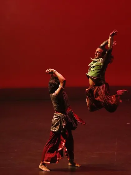 The energy of a duet is unique. This action shot from our show in Portland captures the dynamic and athletic side of our choreography, where Rajendra and I create powerful moments of synchronized movement.