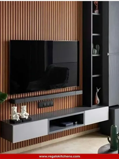 A stylish TV unit with a fluted wood back panel and an asymmetrical shelving unit. This design is perfect for adding texture and functional display space to a living room.