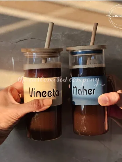 A perfect gift for coffee lovers. These matching glass sippers with custom name sleeves are ideal for enjoying iced coffee and beating the summer heat with a friend or partner.