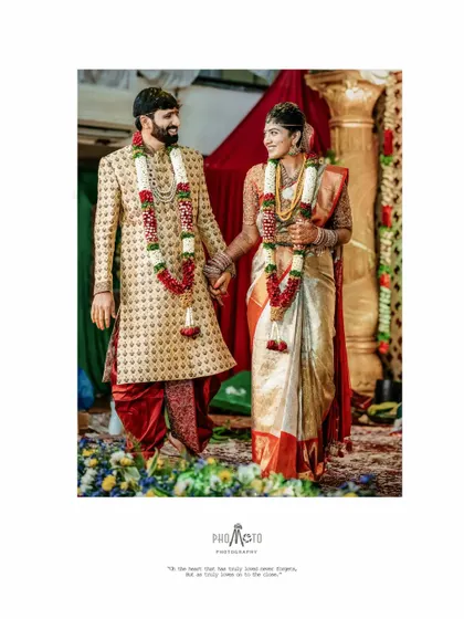 A classic portrait of the couple walking hand-in-hand after their ceremony.