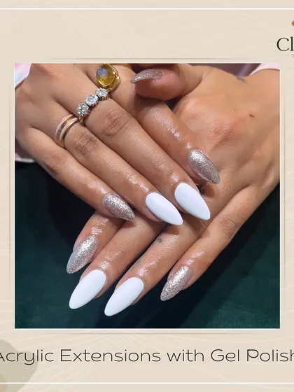 When in doubt, white and glitter is always a beautiful choice. This look combines clean, matte white nails with sparkling silver glitter accent nails for a chic and glamorous contrast.
