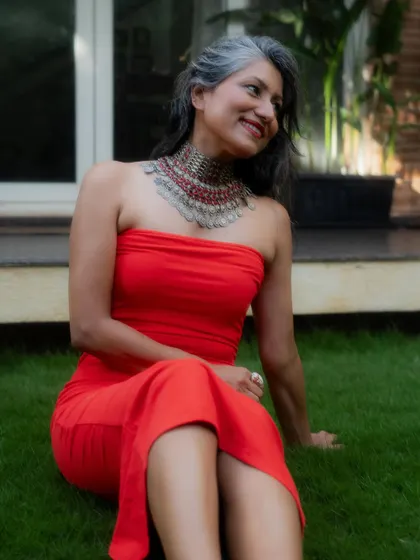 Another shot from my "self-love" series. The combination of the vibrant red dress and the earthy, tribal-inspired jewelry feels both powerful and authentic.