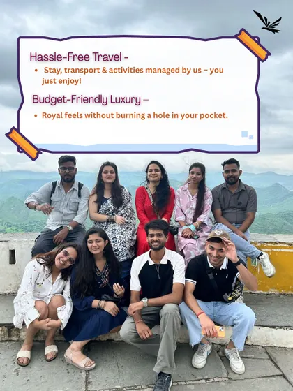 A small group chilling on the steps of a fort. We manage all the travel, stay, and activities, offering a hassle-free and budget-friendly luxury experience.