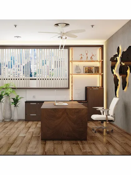 This view highlights the thoughtful details in the executive cabin, including the placement of plants to add life and the minimalist decorative objects on the backlit shelves.