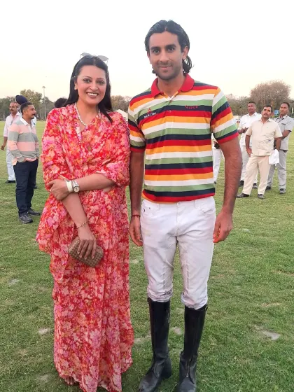 With a player from the winning team at the Jaipur Polo Ground. My interactive hosting style means I step off the stage to connect with the key people of the event, making the experience more personal for everyone.