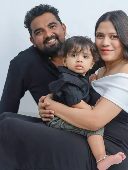 A close-up of a family cuddle. The focus here is on the expressions and the feeling of closeness, creating an intimate and heartwarming family portrait.