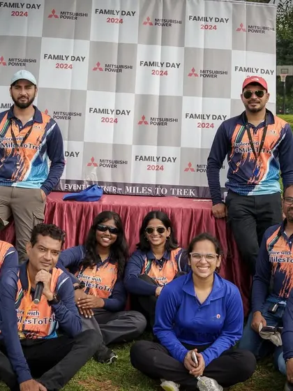 Our core team posing at a Family Day event we managed for Mitsubishi Power. We work as a seamless extension of your company to deliver a professional and fun event.