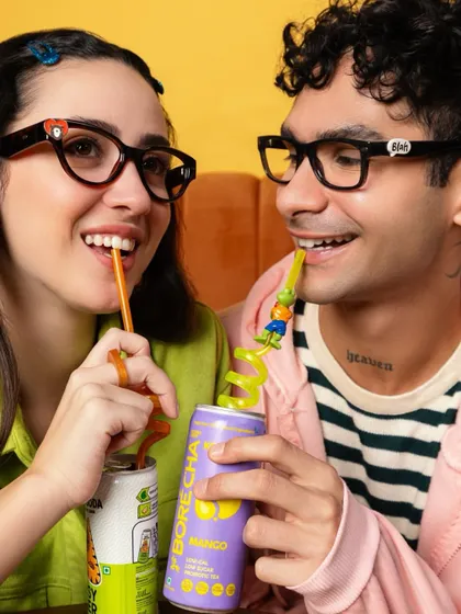This shot from the Lenskart ad captures a cute, casual date vibe. I styled the models in complementary pastel and neon colors to create a visually sweet moment.