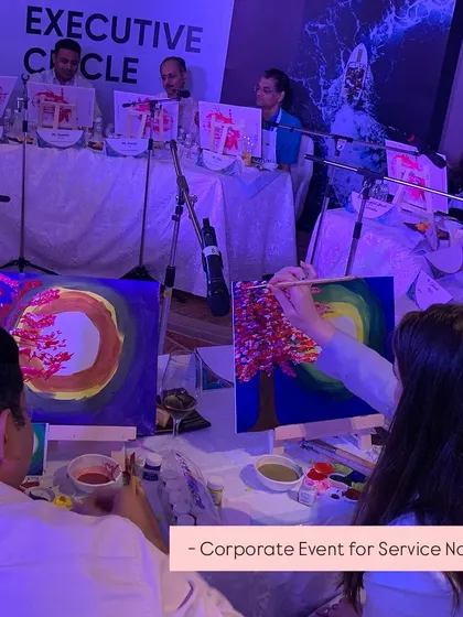 A workshop for Service Now in Delhi, with the room bathed in cool purple light. We can customize the ambiance to match your event's theme.