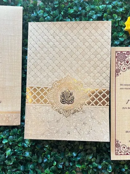 A duplicate of ID 154, this classic beige and gold invitation is perfect for a traditional and elegant wedding.