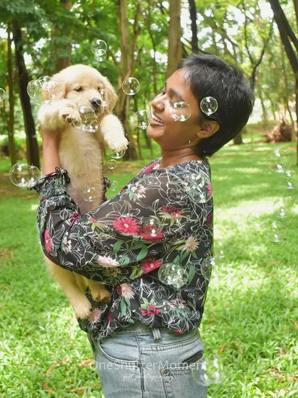 Pure puppy joy surrounded by bubbles. This shot perfectly captures the wonder and playfulness of a young Golden Retriever's first experiences.