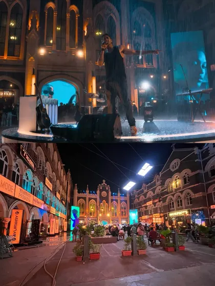 A before-and-after comparison of a street scene from the 'Saiyaara' song 'DHUN'. The bottom image shows the practical set, which we transformed into a vibrant, neon-lit night scene.