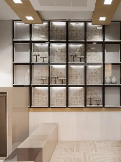 The display area of the jewellery store features custom-built, backlit glass cabinets that make the pieces sparkle. The design is clean and minimalist, ensuring the focus remains on the jewellery.