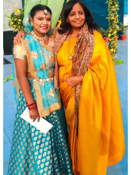 Here I am with a happy client at an event. My team and I are dedicated to our goals and feel blessed to bring our clients' visions to life through dance.