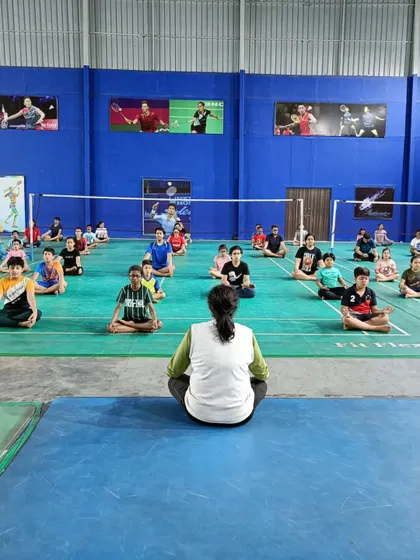 An instructor guides the students through a yoga session. Having dedicated experts for different aspects of training ensures my players receive the best all-around development.
