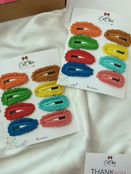 Our simple crochet clips are a bestseller, available in sets of eight different colors.