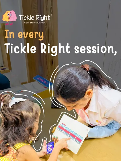 Two girls are deeply engrossed in a flashcard activity, their focus a testament to how our methods capture and hold their attention. Every session is a new opportunity for discovery.