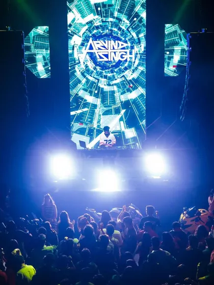 A full view of my stage setup at Sunburn, with my custom visuals on the towering LED screen. This is what a world-class club experience looks like.