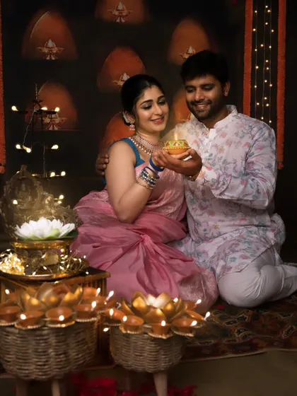 A beautiful couple shares a diya, celebrating the festival of lights together in our studio.