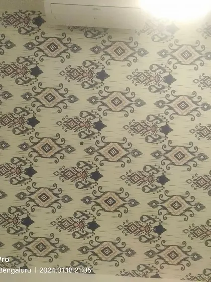Another angle of the ikat ceiling wallpaper.