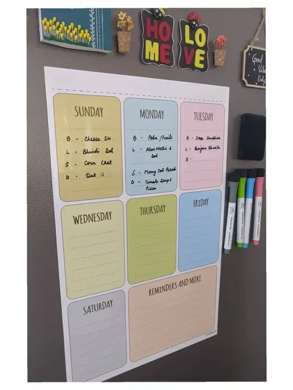 I use this magnetic weekly planner on my fridge to map out our meals. It's a simple tool that makes a huge difference in keeping my week organized.