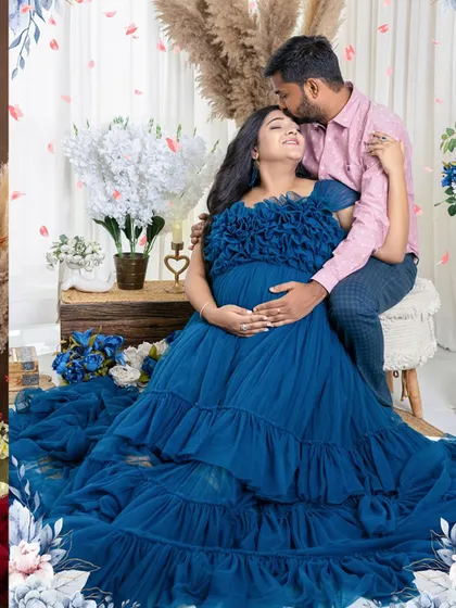 A tender moment captured between the expecting couple. The gentle kiss on the forehead is a simple, timeless expression of love and care that we love to photograph.