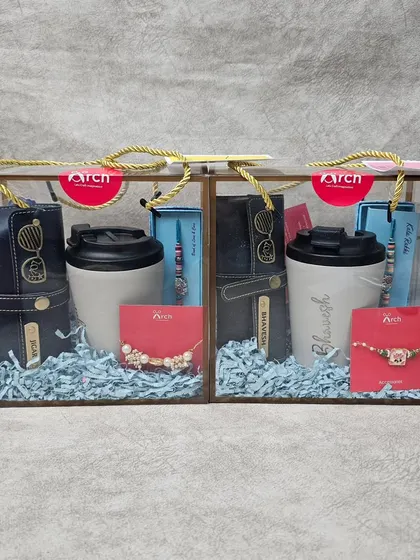 Matching Rakhi hampers for a brother and sister. The hampers include personalized travel mugs and wallets, reflecting their individual styles while maintaining a cohesive look.