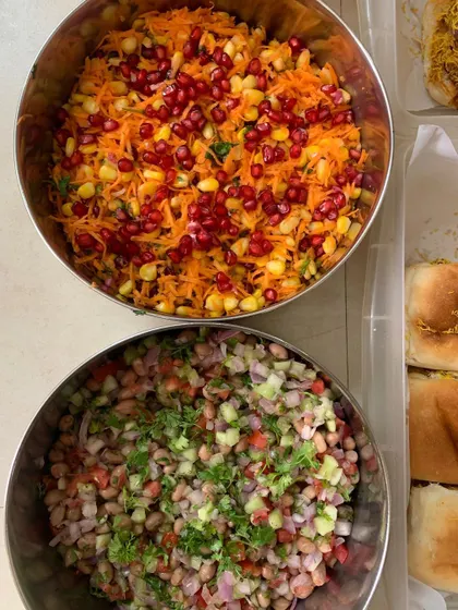 Fresh salads for a large gathering, including a vibrant Corn Carrot Kosambri and a refreshing Peanut Kachumber.