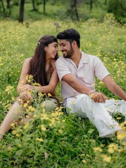 Looking at each other with love and laughter. This is what a candid couple photoshoot is all about.