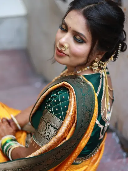 A gorgeous Maharashtrian bride. I loved creating this look with the traditional nauvari saree, nath, and a beautiful hairstyle featuring fresh yellow flowers.