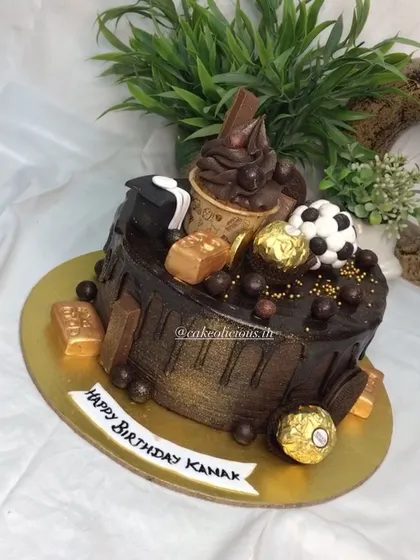This angle shows all the delicious toppings on the ultimate chocolate lover's cake.
