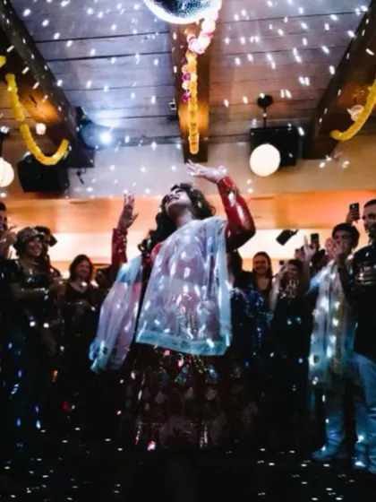 A guest lost in the moment under a disco ball at a Diwali house party. My goal is to bring that dance floor magic to any space.